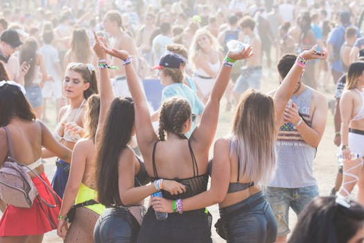 Colorful festival crowd enjoying food and music